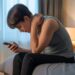 Neck Pain From Looking Down at Your Phone in Bed — Fast Fix + Prevention
